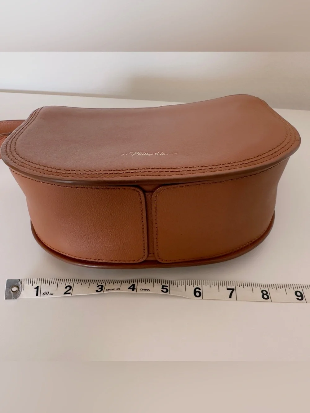 EUC 3.1 Phillip Lim Pashli Saddle Bag in tan leather